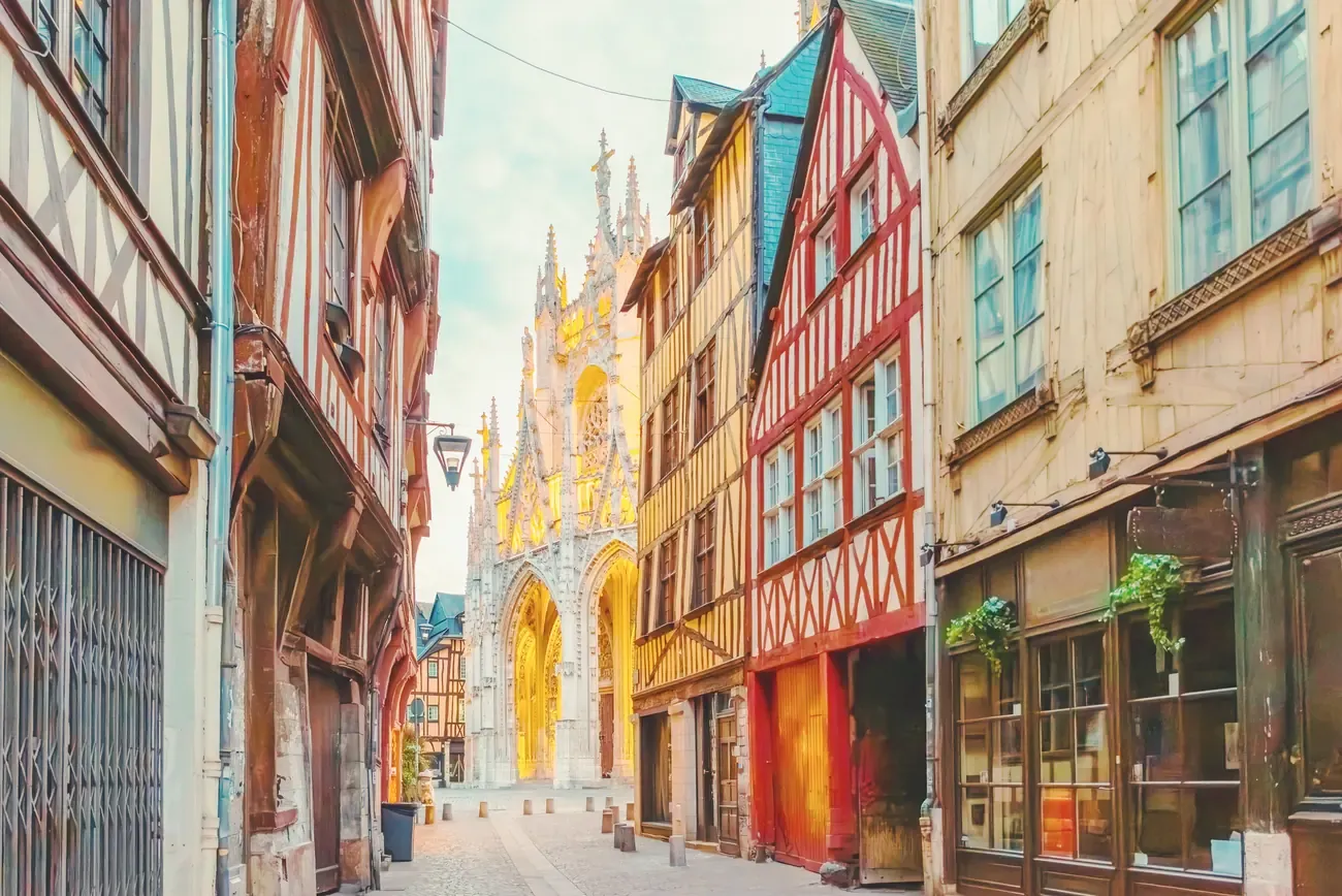 Half-timbered houses along the street leading to the Gothic church of Saint-Maclou in Rouen, France