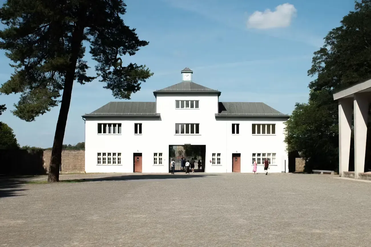 Exterior of the Sachsenhausen Memorial gatehouse under a clear sky