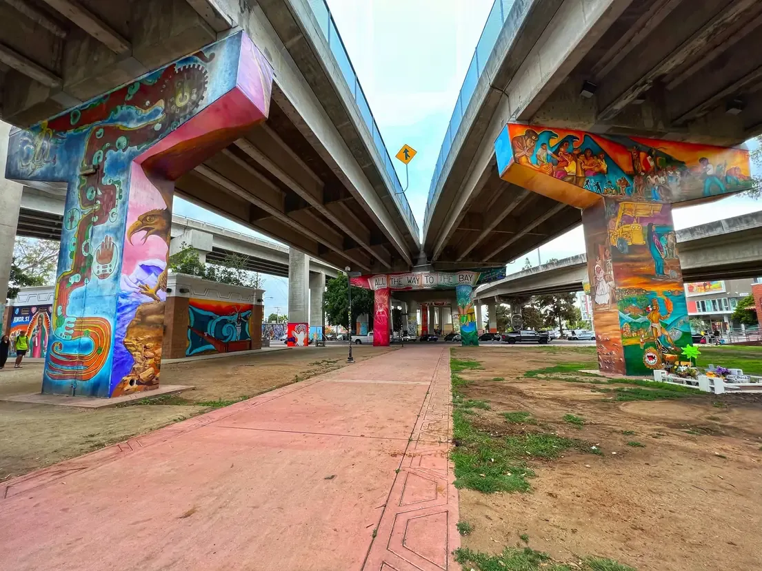 The mural-painted pillars of Chicano Park under the Coronado Bridge in San Diego