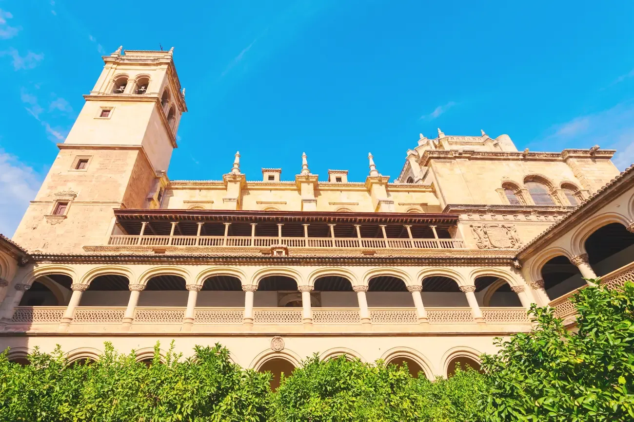 Two-tier arcaded cloister with orange trees at the Monastery of San Jeronimo in Granada