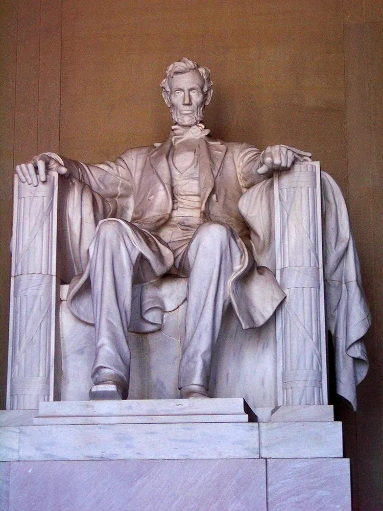 The seated marble statue of Abraham Lincoln inside the Lincoln Memorial in Washington, D.C.