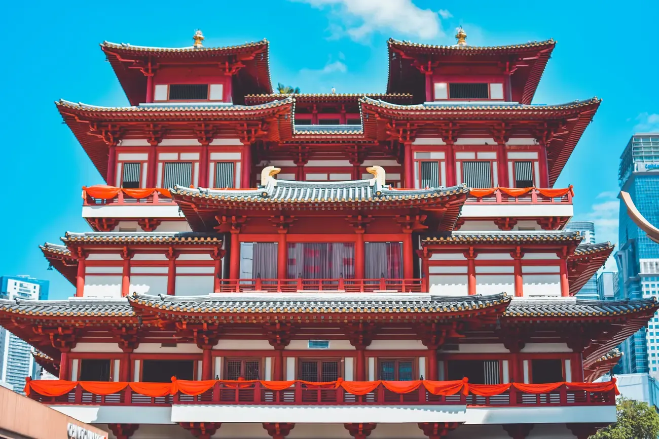 The red and gold facade of the Buddha Tooth Relic Temple and Museum in Singapore