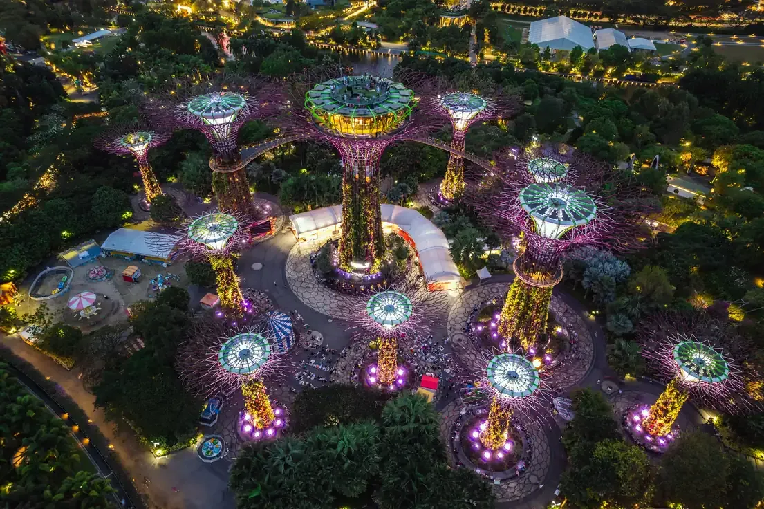An aerial view of the Cloud Forest dome and Supertree Grove at Gardens by the Bay in Singapore