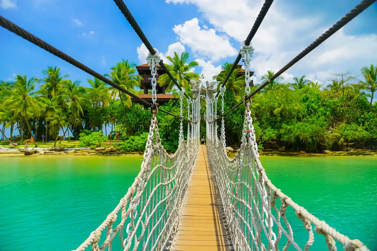 The rope suspension bridge to the islet at Palawan Beach on Sentosa Island, Singapore