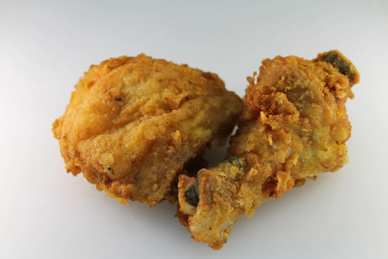 Pieces of crisp southern fried chicken on a plate