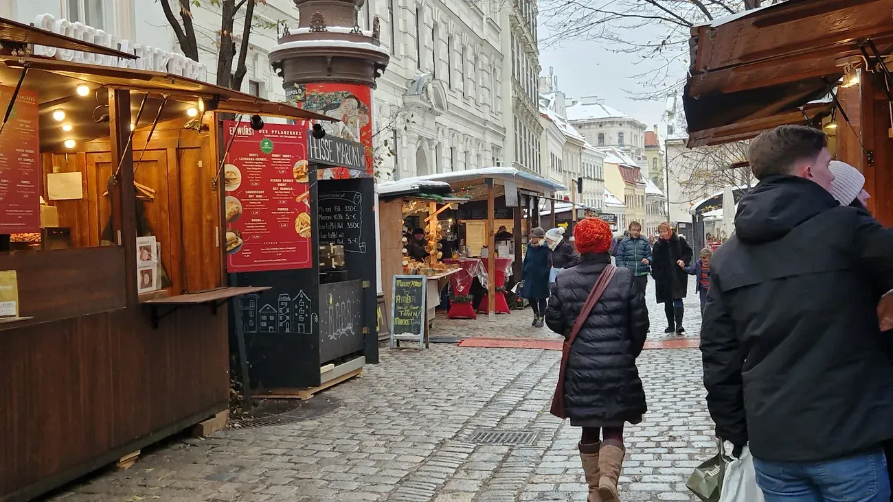 Christmas market stalls along a cobbled lane in Spittelberg, Vienna