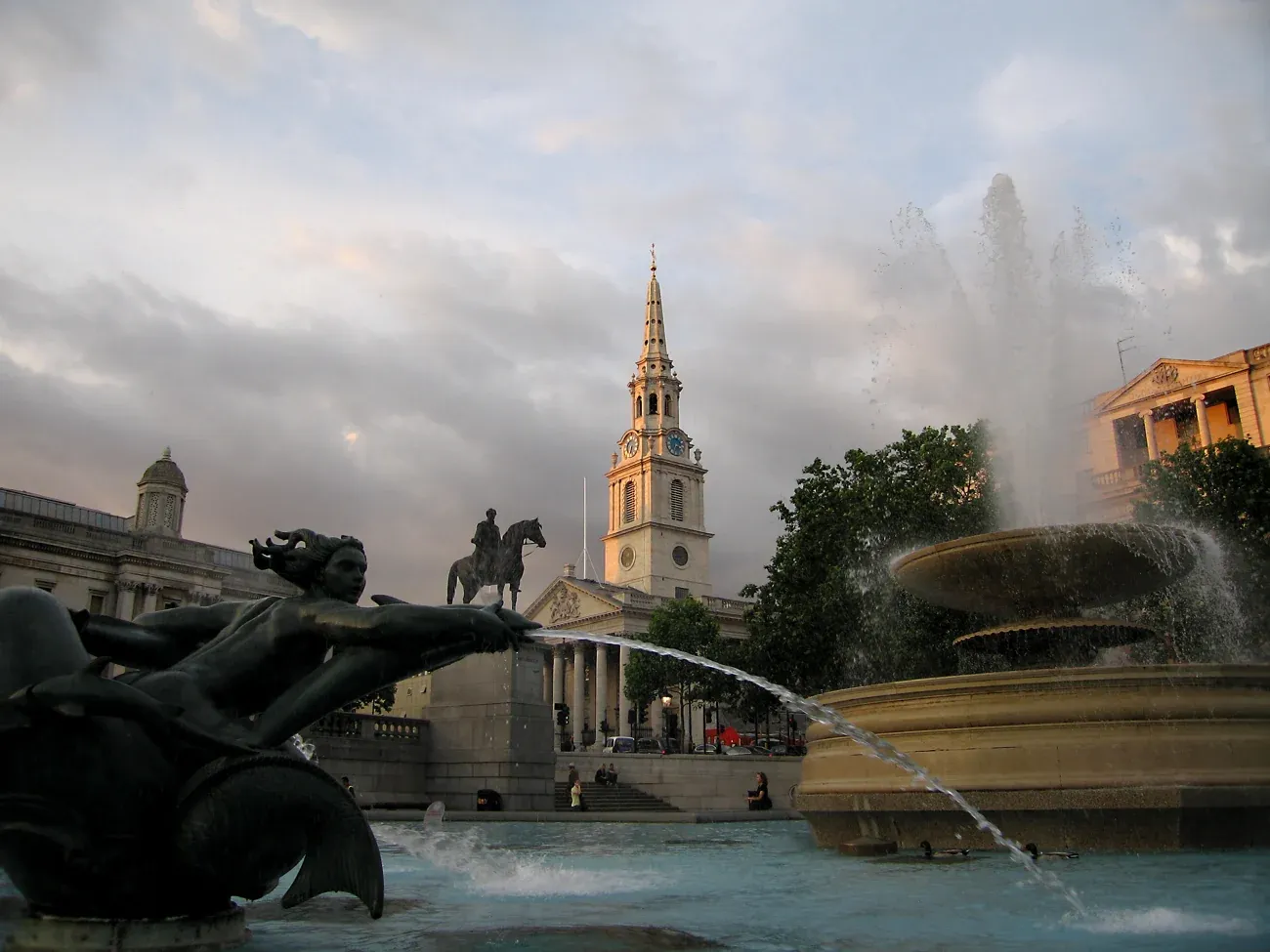 St Martin-in-the-Fields church seen across a fountain in Trafalgar Square, London