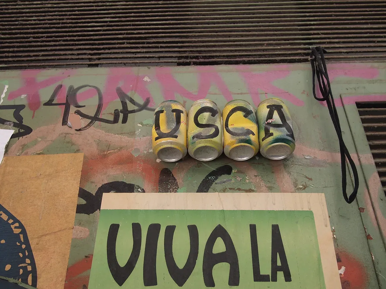 Street art collage on a wall in El Raval, Barcelona
