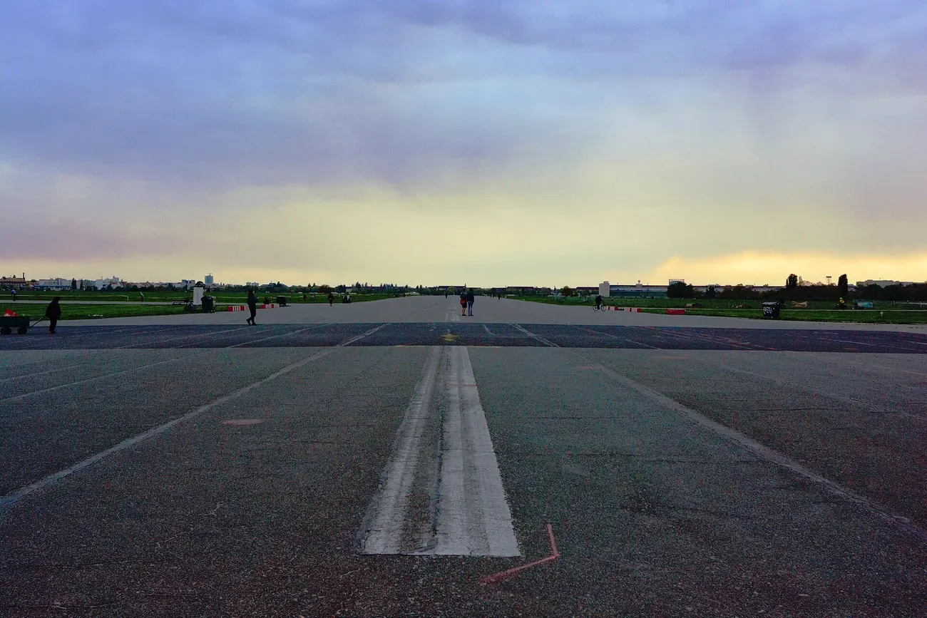 A runway of the former Tempelhof airport at dusk on the Tempelhofer Feld in Berlin