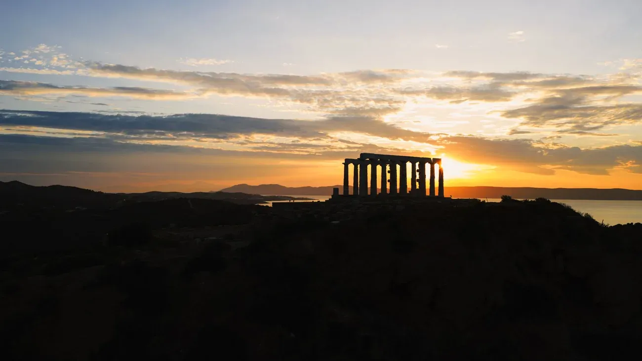 Sunset behind the Temple of Poseidon at Cape Sounion