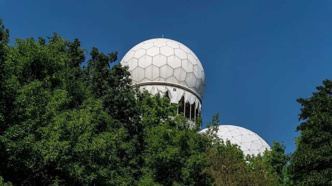 The white radar domes of the Teufelsberg listening station above the Grunewald in Berlin