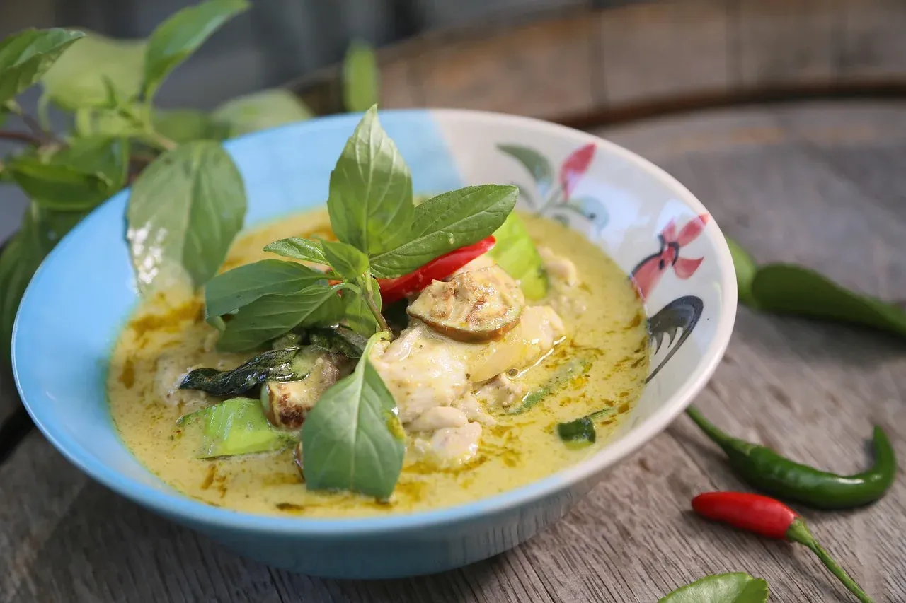 Green curry with Thai basil and chillies in a bowl