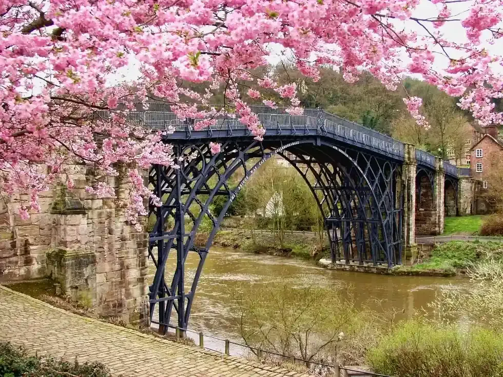 The Iron Bridge arching over the River Severn at Ironbridge in Shropshire