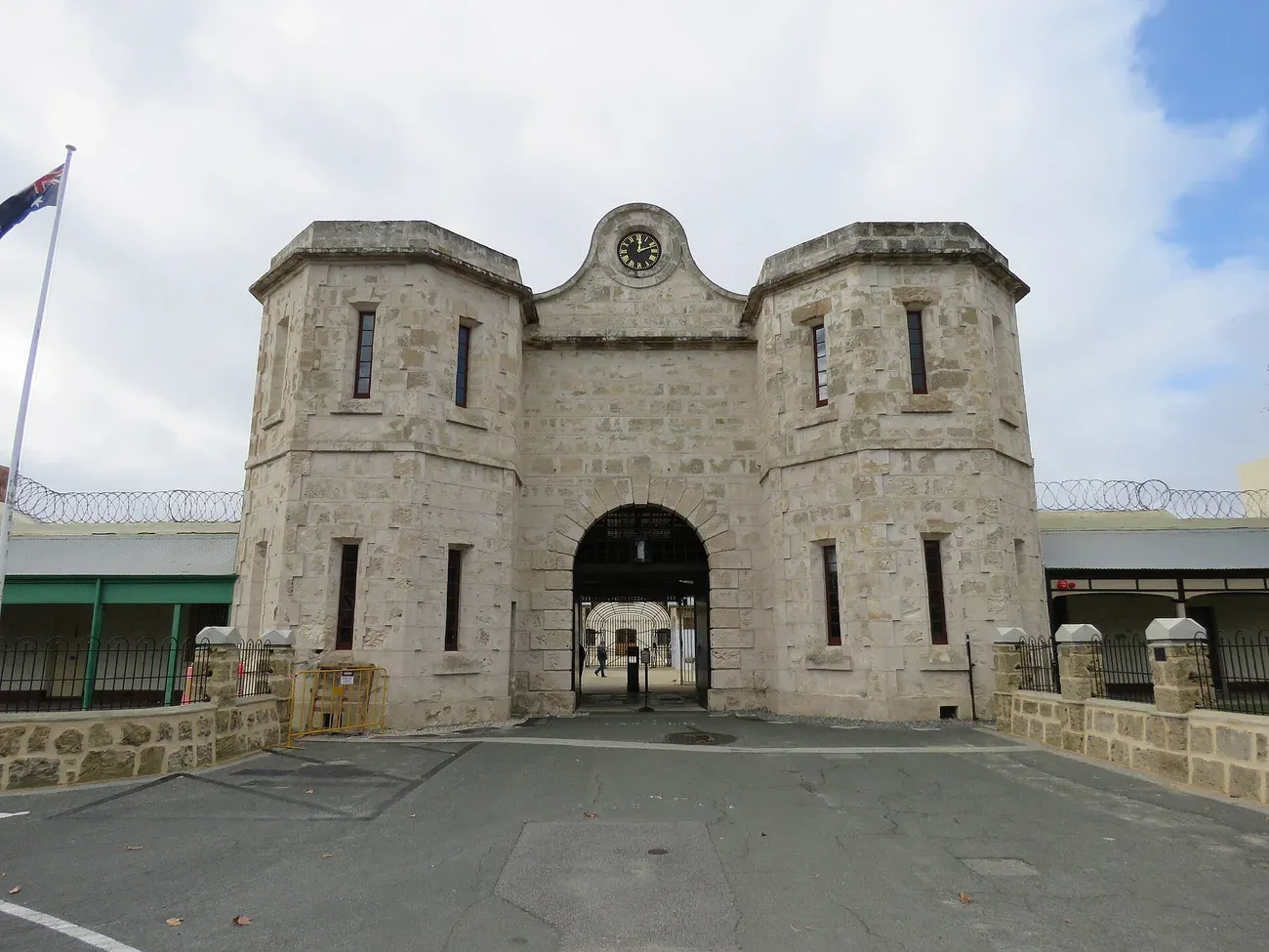 The limestone gatehouse and clock of Fremantle Prison in Western Australia