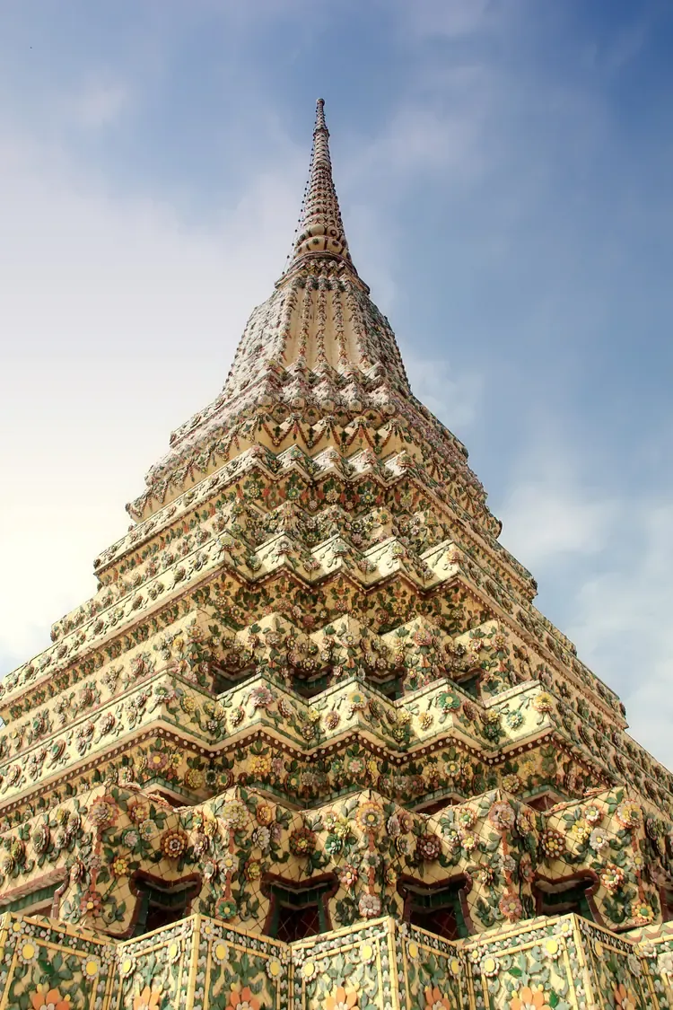 Detailed floral porcelain mosaic on the spire of Wat Arun, the Temple of Dawn.