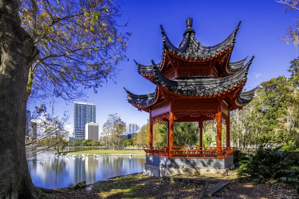 Red Chinese pagoda on the shore of Lake Eola Park in Orlando