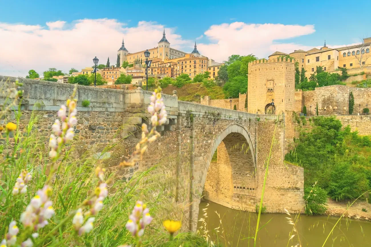 The Alcantara Bridge with the Alcazar of Toledo in the background, Spain