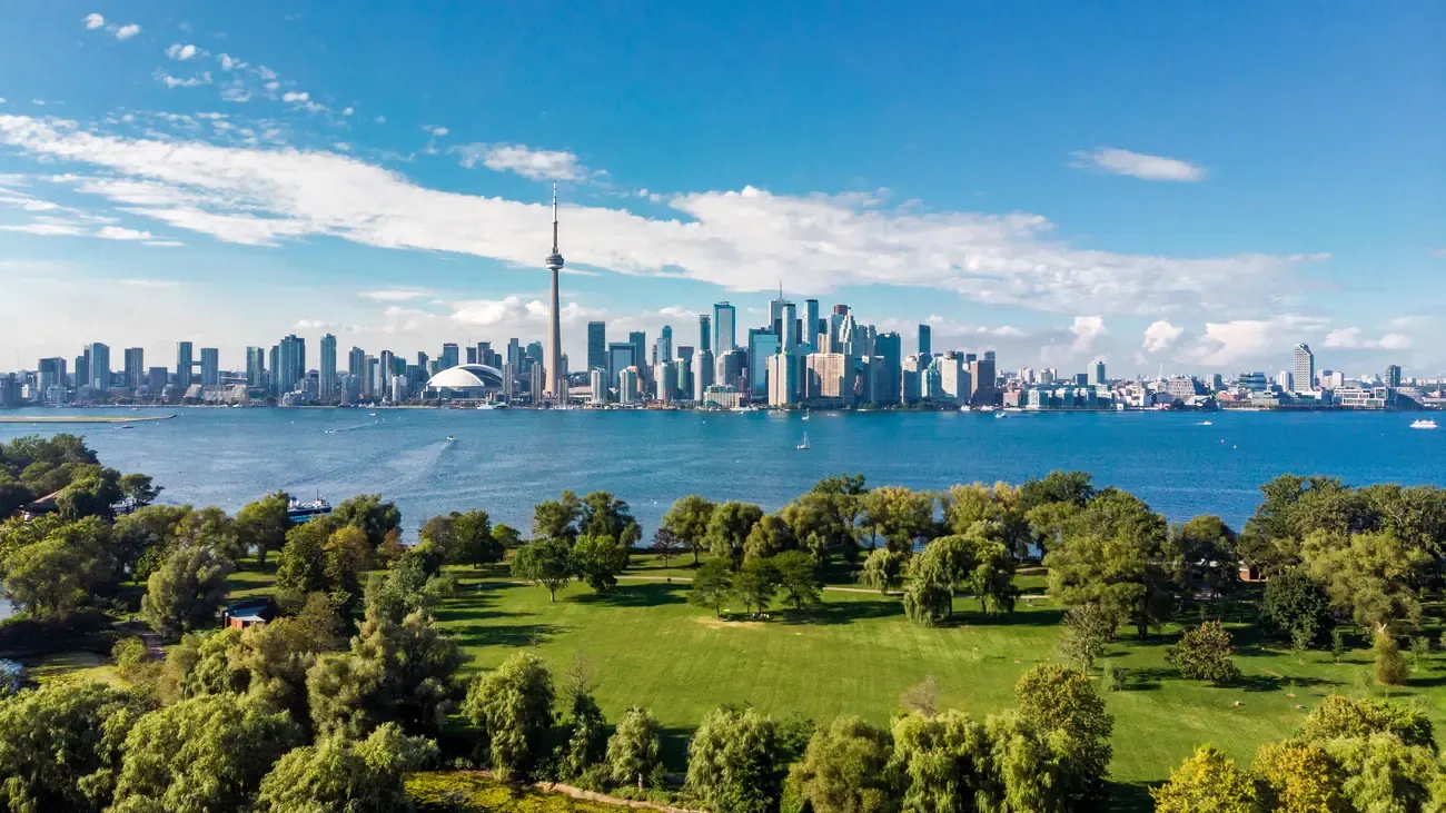 The Toronto skyline and CN Tower seen across the lake from the Toronto Islands