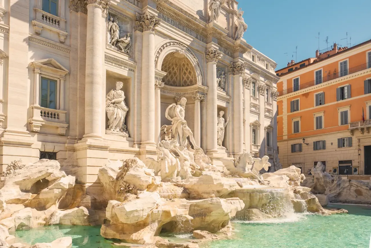 The baroque facade of the Trevi Fountain in Rome