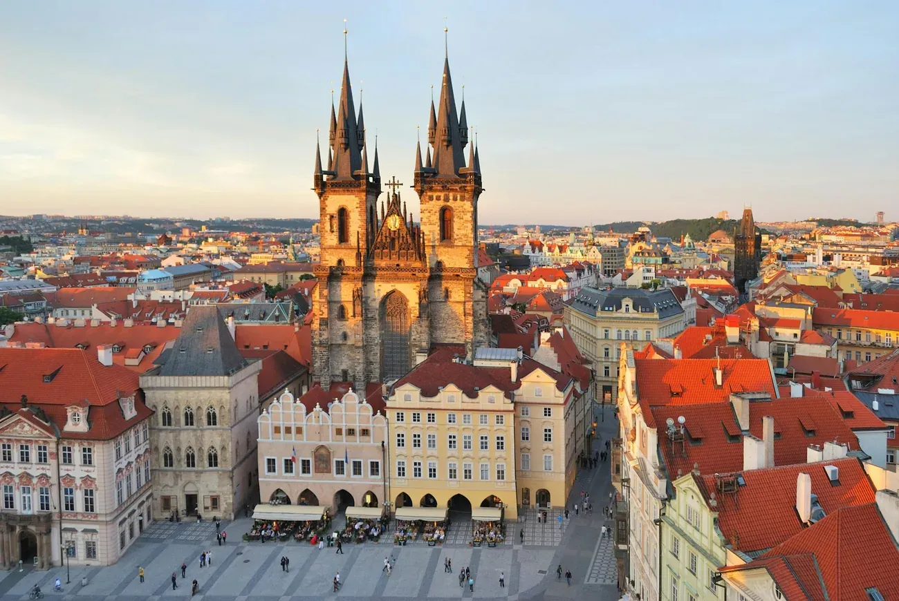 The spires of Tyn Church rising over the rooftops of the Old Town in Prague