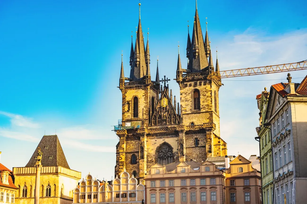 The Gothic spires of Tyn Church over Old Town Square in Prague