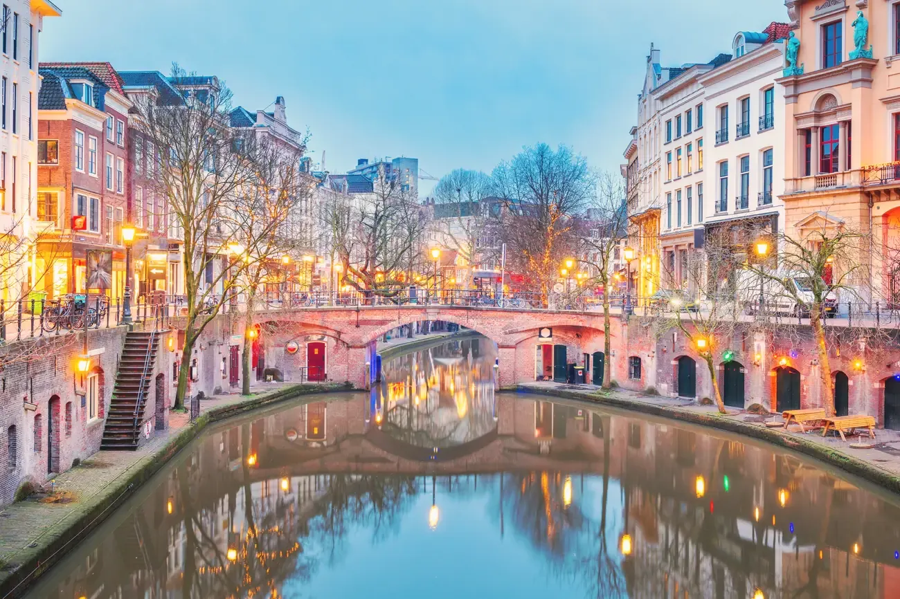 Utrecht's historic canals and cityscape at twilight, Netherlands