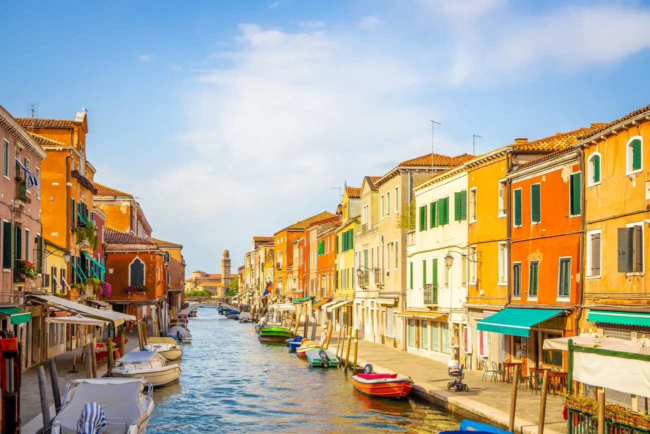 The colourful houses along a canal on the island of Murano near Venice in summer