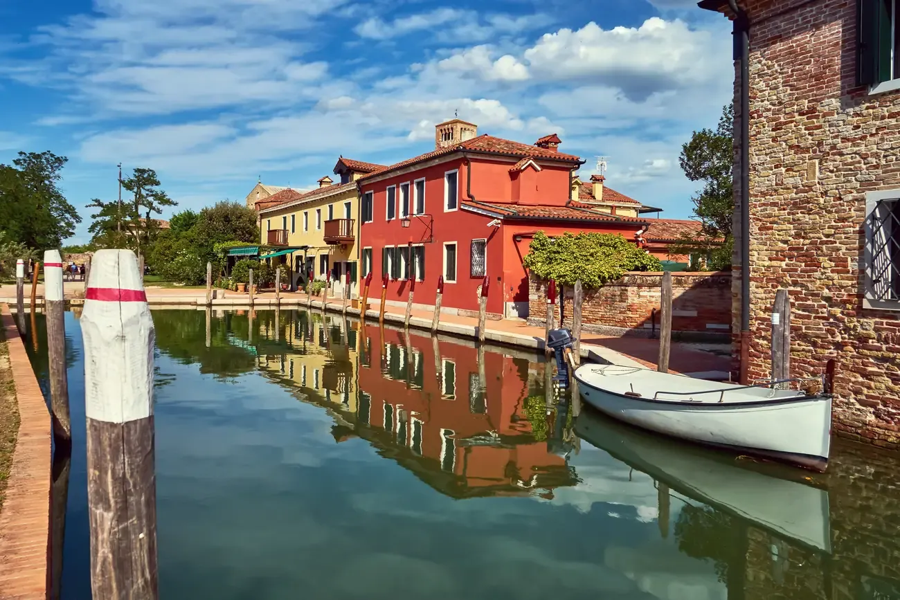 Colourful houses along a canal on Torcello island, Venice