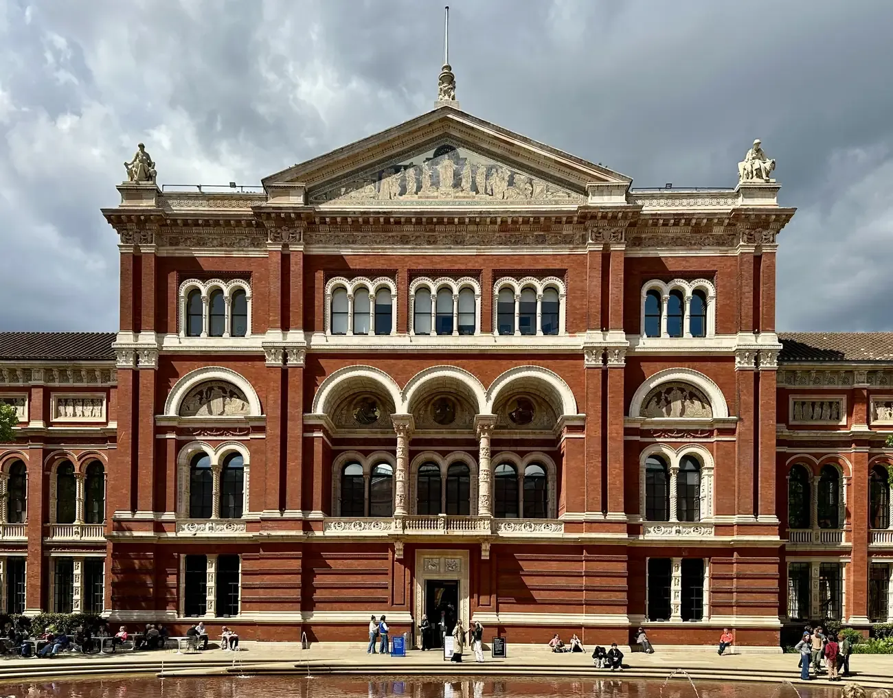 The John Madejski Garden courtyard and red-brick facade of the V&A South Kensington in London