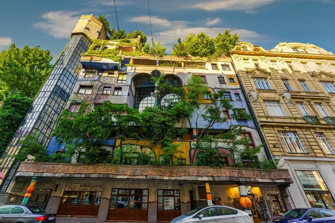 The colourful Hundertwasserhaus with facade greenery in Vienna