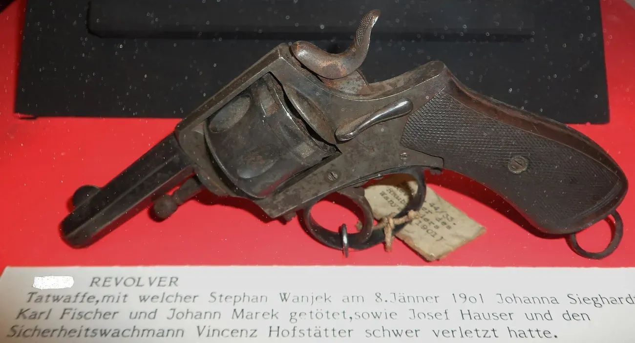 A revolver displayed as the murder weapon from a 1901 triple killing at the Kriminalmuseum in Vienna
