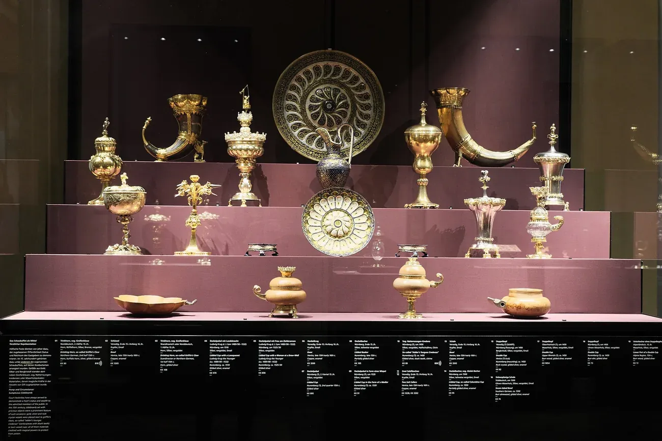 A tiered display case of gilded silver cups, drinking horns and vessels in the Kunstkammer of Vienna's Kunsthistorisches Museum