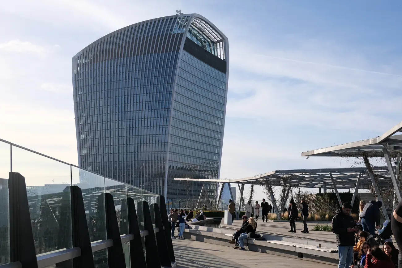 The Walkie-Talkie tower rising above the open roof terrace of The Garden at 120 in London