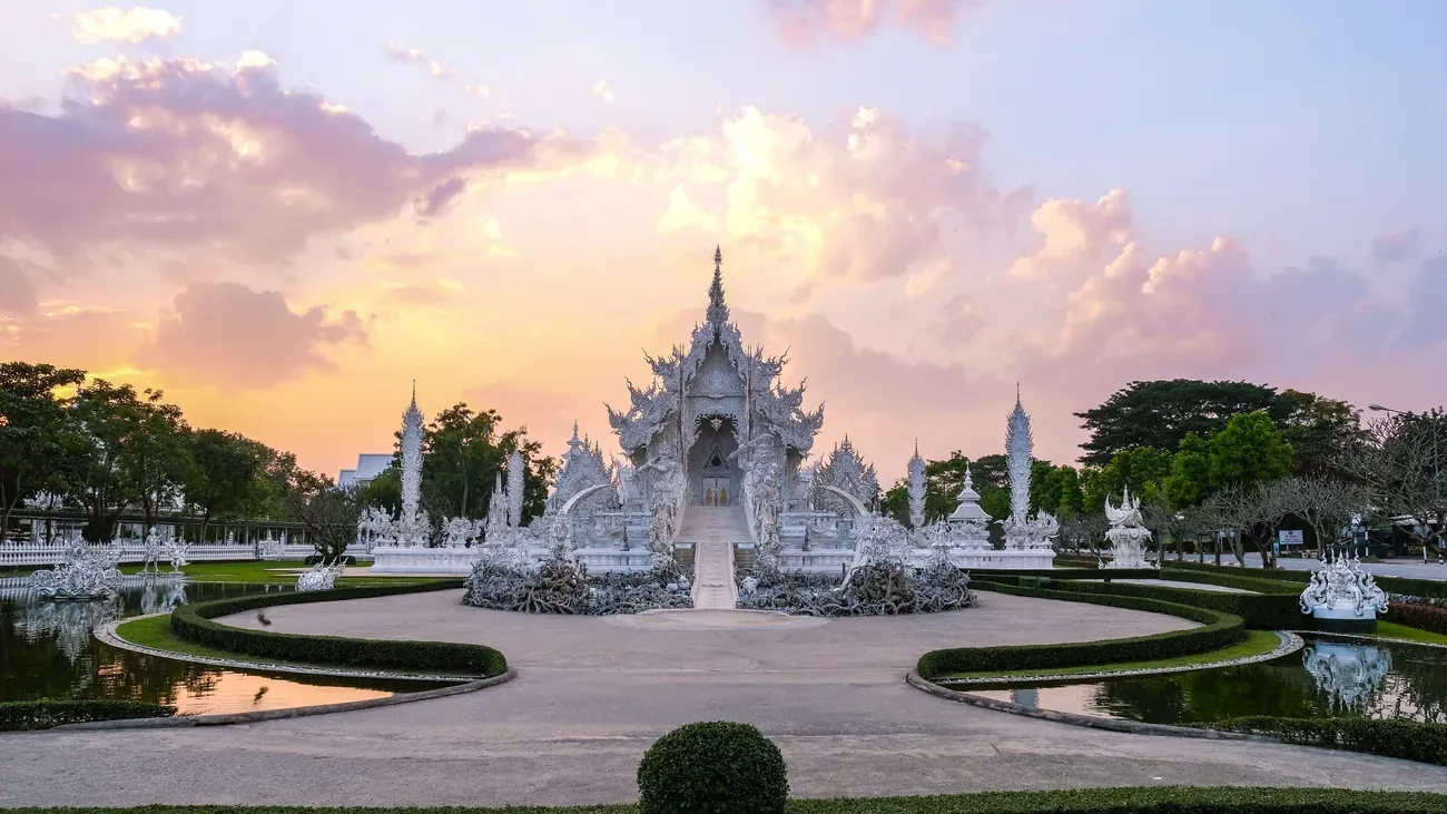 The all-white Wat Rong Khun temple at sunset, Chiang Rai