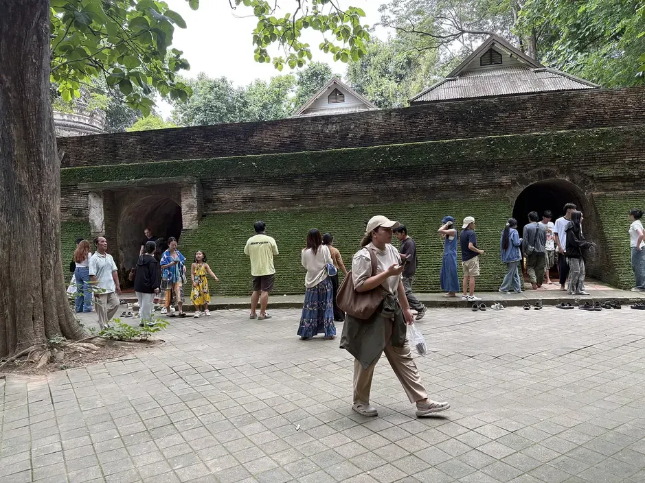 Arched tunnel entrances and the chedi above the brick mound at Wat Umong, Chiang Mai