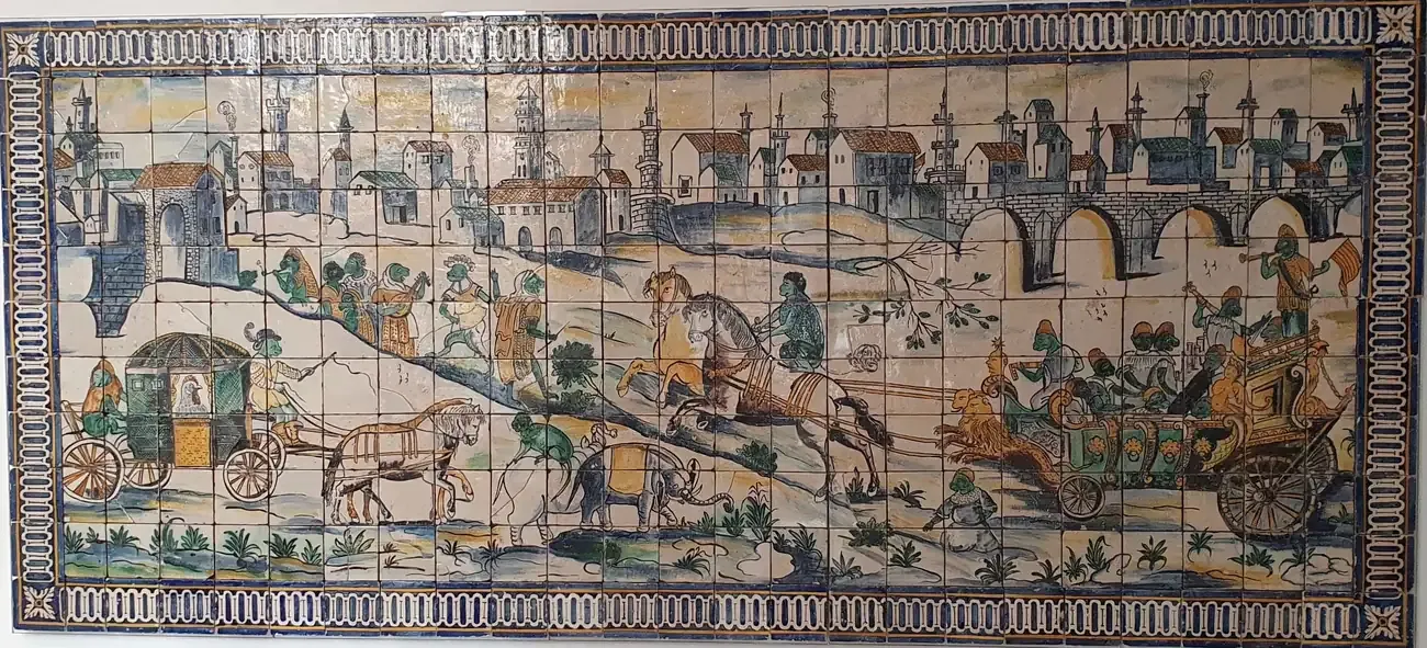 The seventeenth-century Wedding of the Hen azulejo tile panel showing a comic procession, at the Museu Nacional do Azulejo in Lisbon