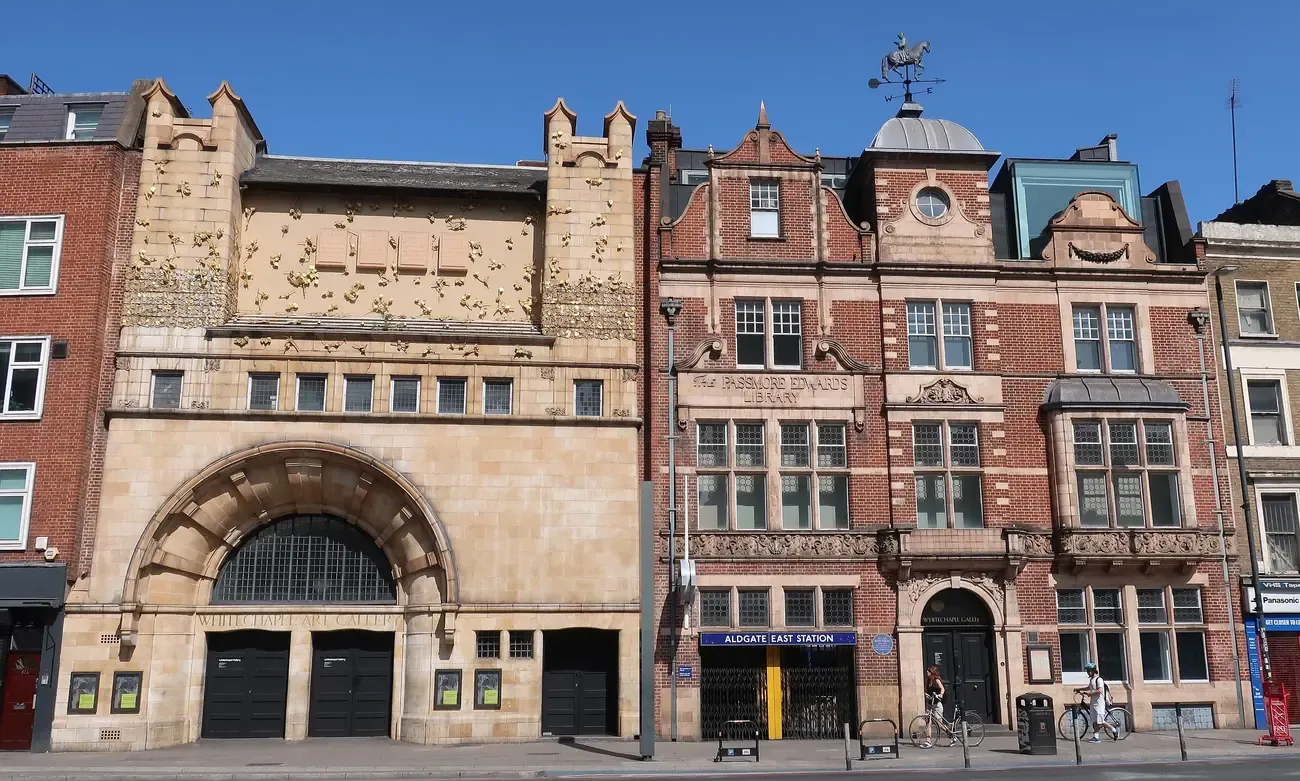 The terracotta facade of Whitechapel Gallery and its neighbouring former library on Whitechapel High Street, London
