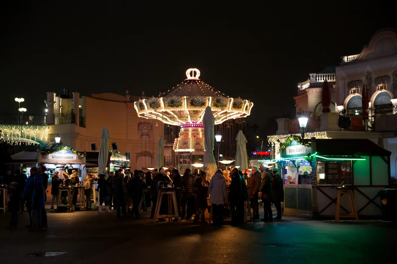The Winter Market on Riesenradplatz in the Prater at night, with its carousel, Vienna