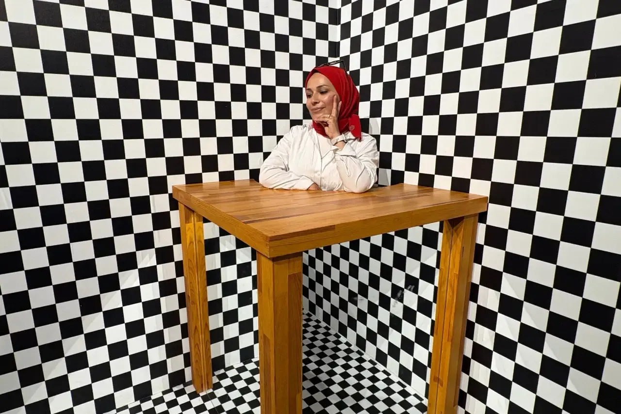 Woman in an illusion museum