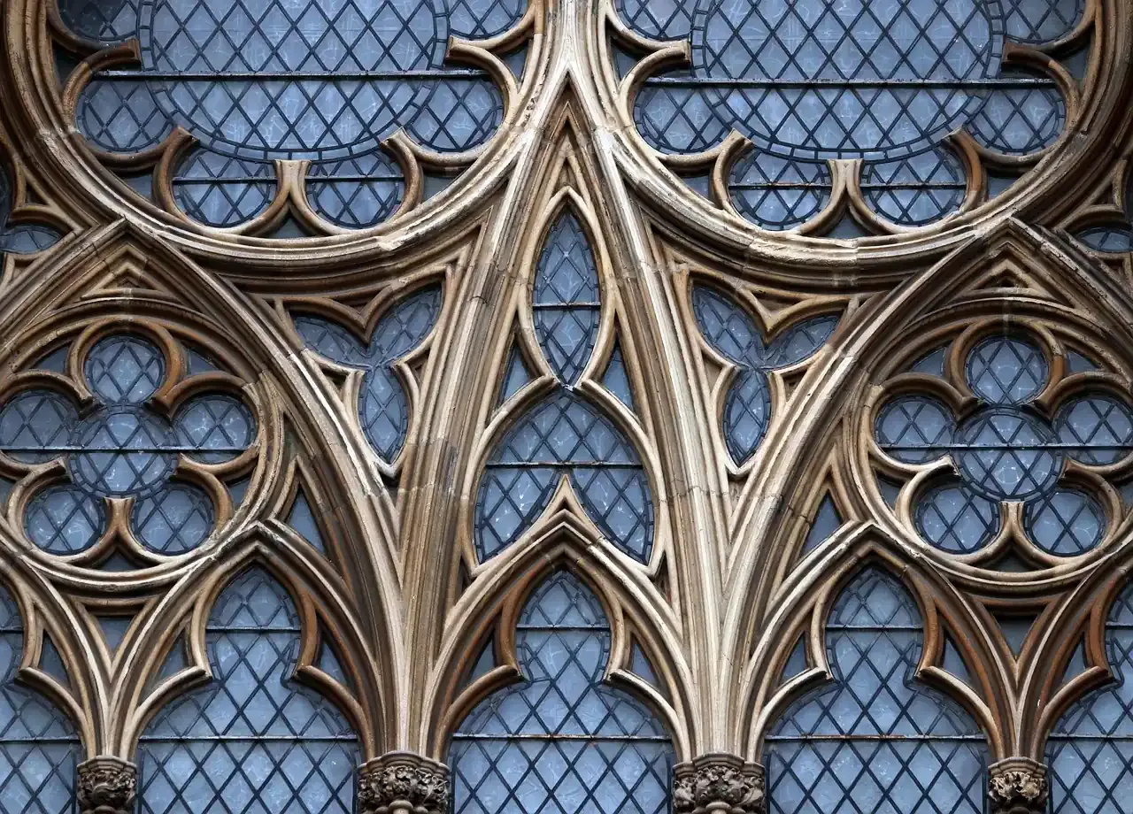 Stone tracery and stained glass of a Gothic window at York Minster in York